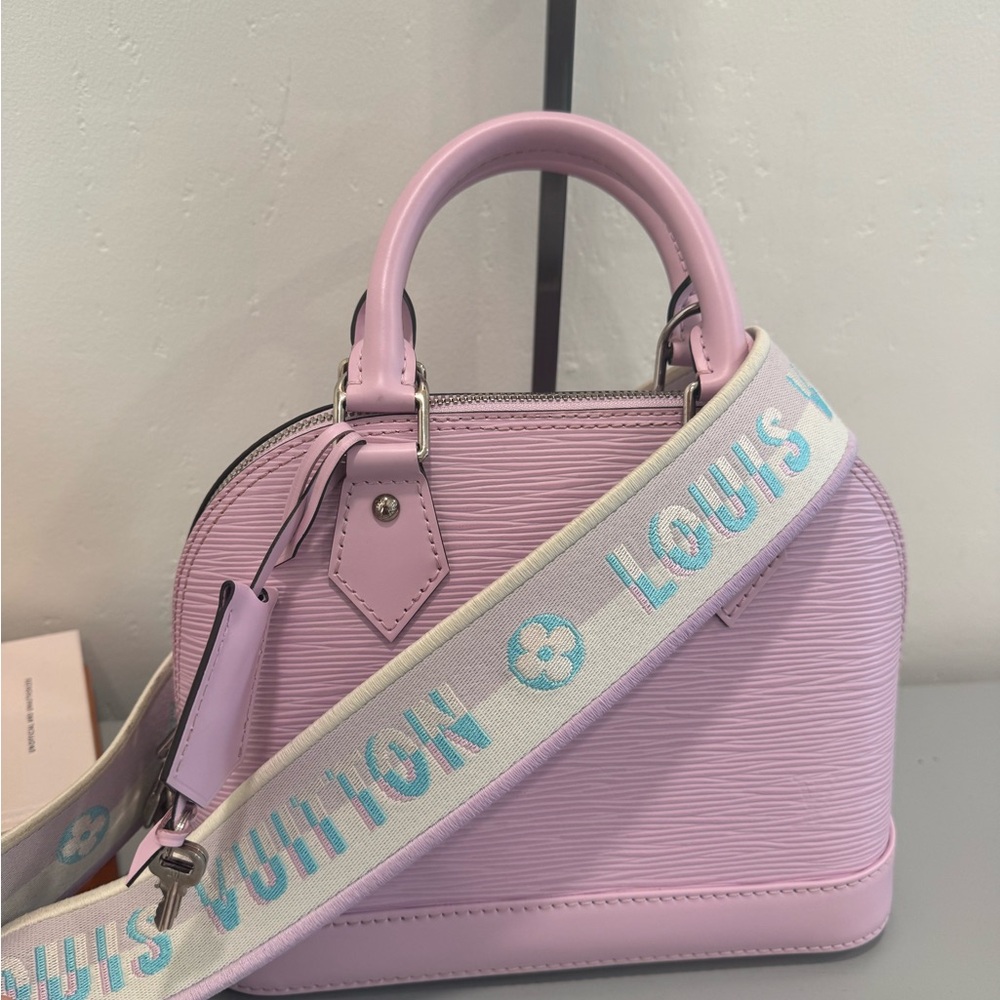 Louis Vuitton Alma BB epi leather guitar monogram strap